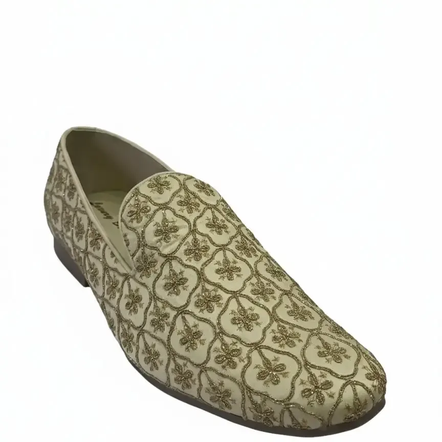 Hand-embroidered gold jutis